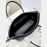 The Row Ewa curved handbag