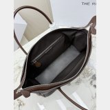 The Row Ewa curved handbag