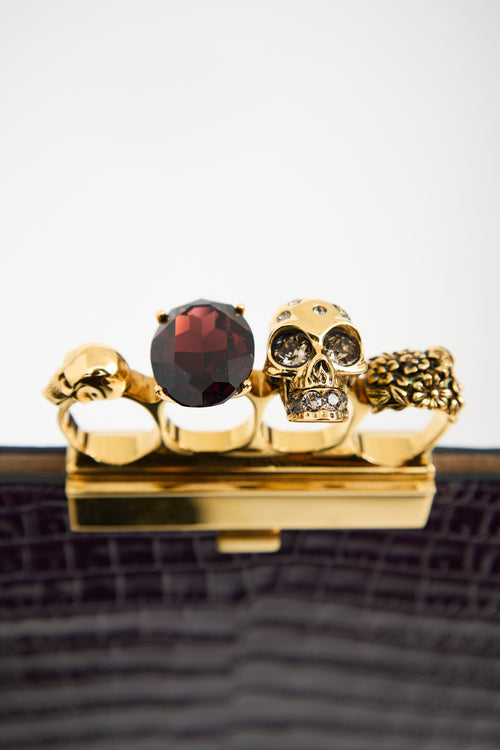 Alexander Mcqueen Purple Leather Skull Four Ring Clutch