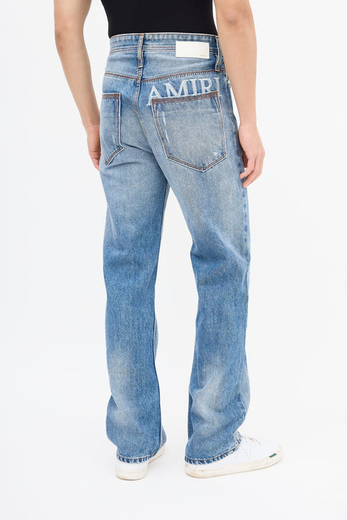 Amiri Light Wash Embroidered Logo Jeans