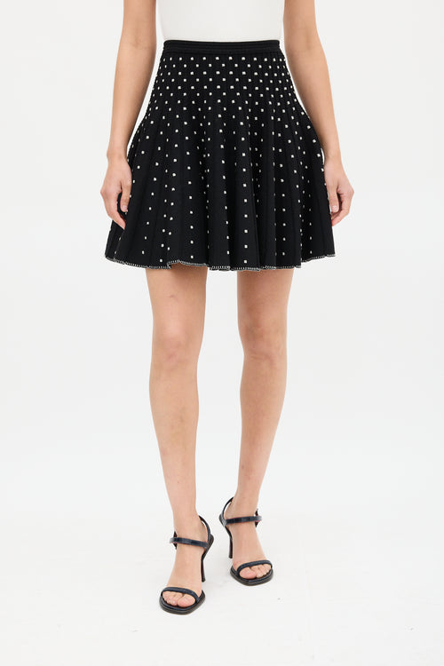 Alaïa Black 
White Embroidered Dot Mini Skirt