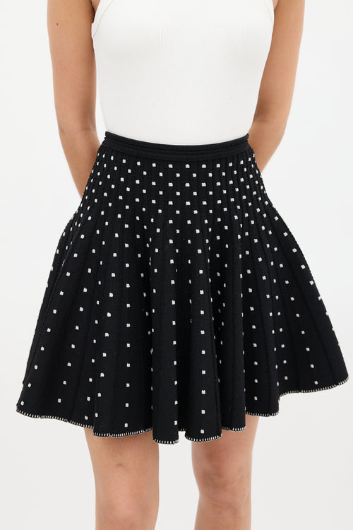 Alaïa Black 
White Embroidered Dot Mini Skirt