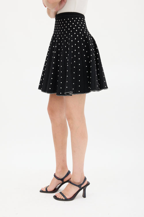 Alaïa Black 
White Embroidered Dot Mini Skirt