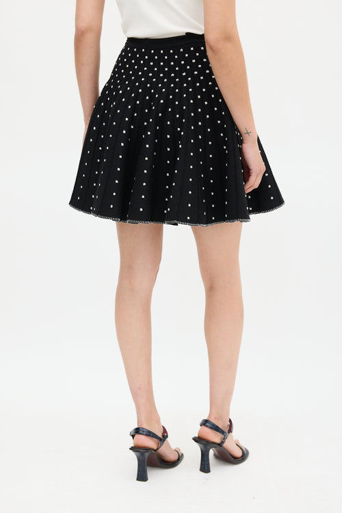 Alaïa Black 
White Embroidered Dot Mini Skirt