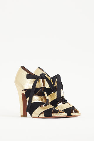 Alaïa Gold 
Black Textured Leather Lace Up Heel