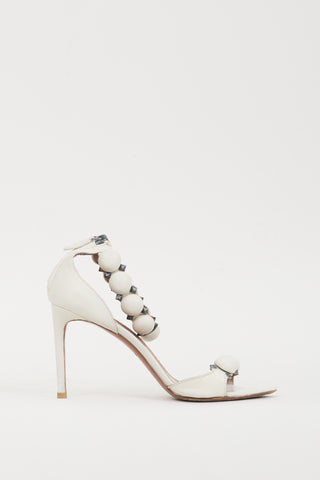 Alaïa White 
Silver Leather Bombe Sandal