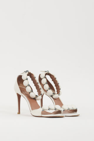 Alaïa White 
Silver Leather Bombe Sandal