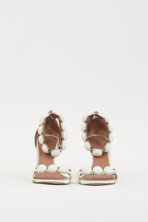 Alaïa White 
Silver Leather Bombe Sandal