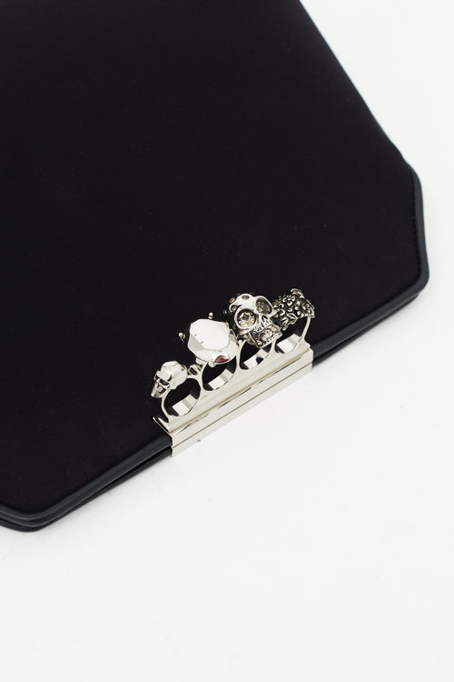 Alexander McQueen Black Neoprene Four Ring Skull Clutch