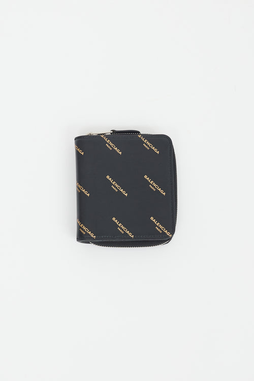 Balenciaga Black 
Gold Logo Printed Zip Wallet