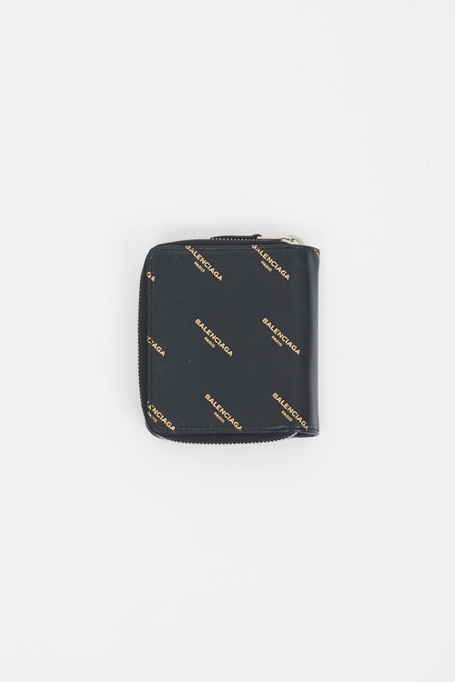 Balenciaga Black 
Gold Logo Printed Zip Wallet