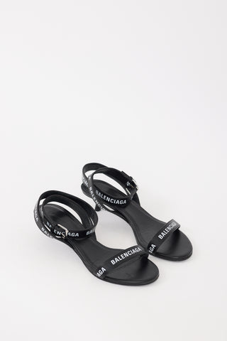 Balenciaga Black 
White Leather Logo Sandal