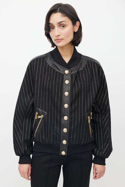 Balmain Black 
Gold Stripe Bomber Jacket