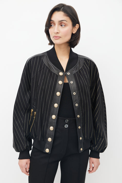 Balmain Black 
Gold Stripe Bomber Jacket