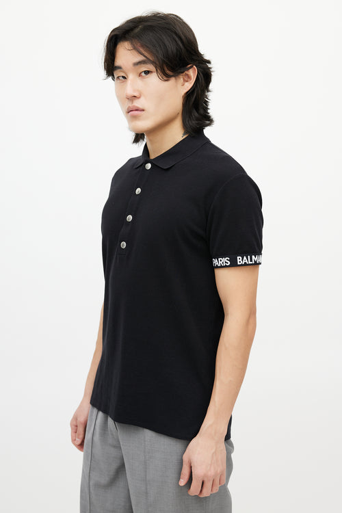 Balmain Black 
White Knit Logo Polo