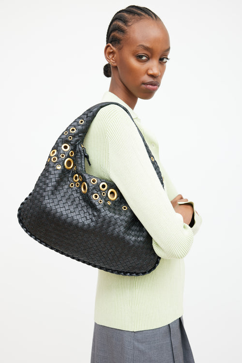 Bottega Veneta Black Intrecciato Leather 
Gold Grommet Bag