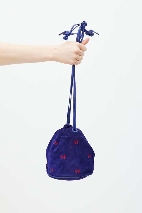 Bottega Veneta Purple 
Red Suede Cutout Drawstring Bag