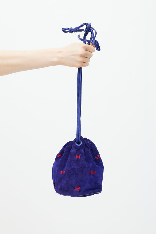 Bottega Veneta Purple 
Red Suede Cutout Drawstring Bag