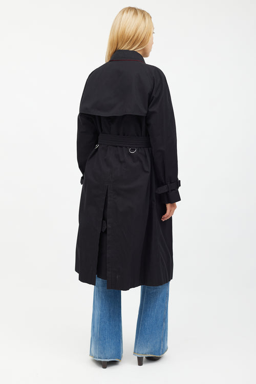 Burberry Black 
Red Trim Trench Coat