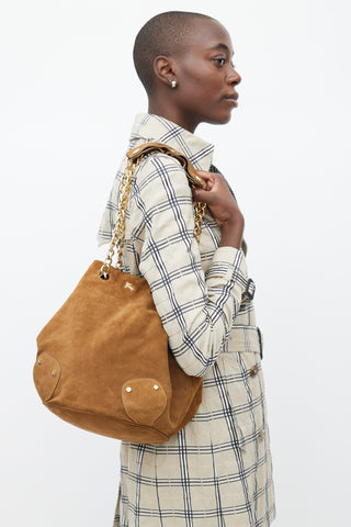 Burberry Brown 
Gold Suede Bucket Bag