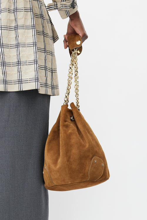 Burberry Brown 
Gold Suede Bucket Bag