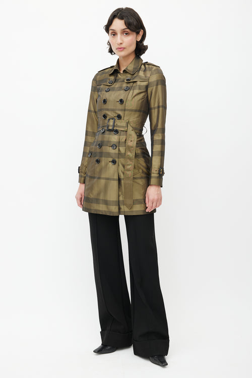 Burberry Green 
Black Plaid Double Breasted Trench Coat