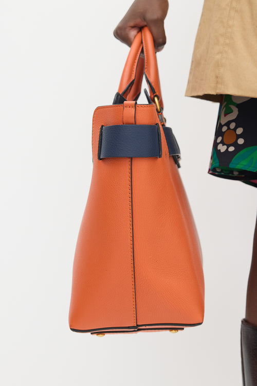 Burberry Orange 
Navy Leather Medium Belt Tote Bag