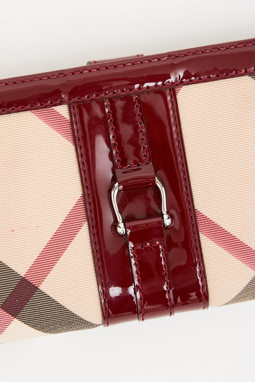 Burberry Burgundy Patent Leather 
Nova Check Wallet