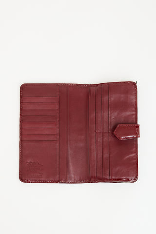 Burberry Burgundy Patent Leather 
Nova Check Wallet