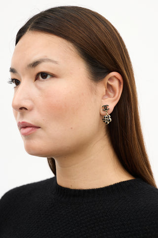 Chanel SS 2009 Gold 
Black Camelia CC Drop Earrings