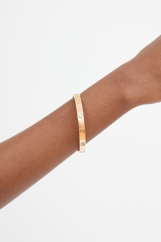 Cartier 18K Rose Gold 
Diamond Love Bracelet