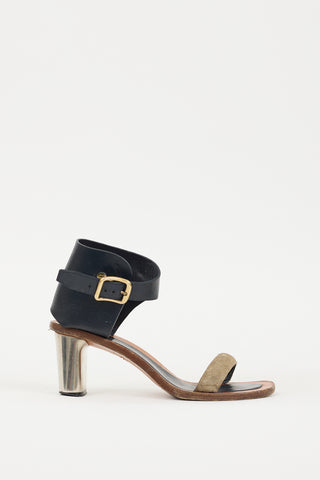 Celine Brown 
Black Buckle Heel