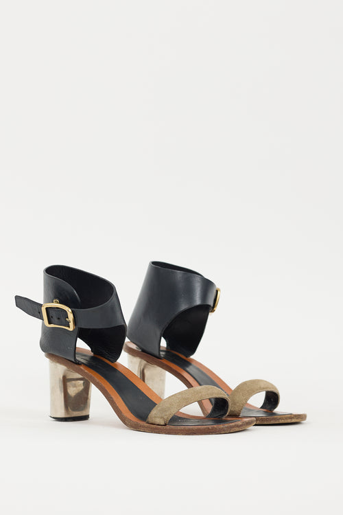 Celine Brown 
Black Buckle Heel