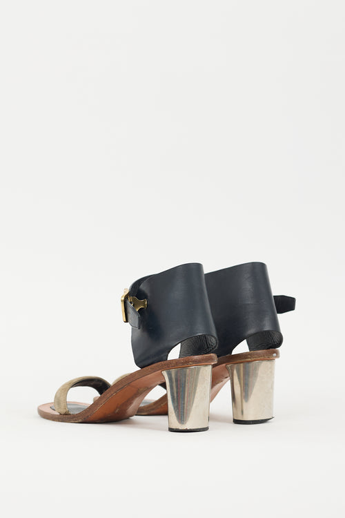 Celine Brown 
Black Buckle Heel