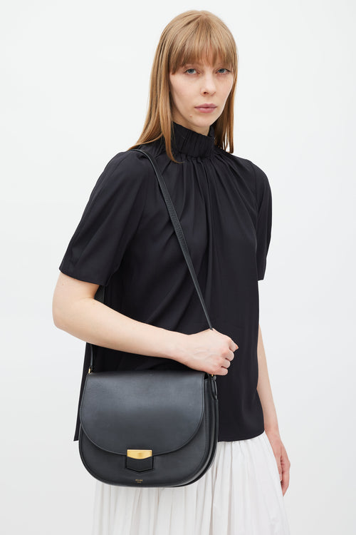 Celine Black 
Gold Trotteur Leather Bag