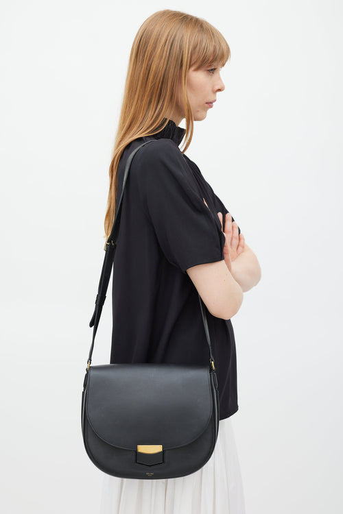 Celine Black 
Gold Trotteur Leather Bag