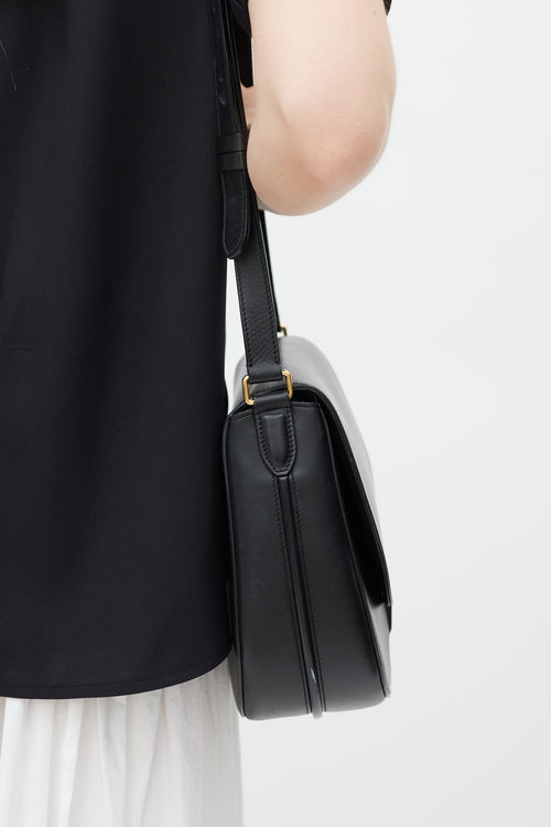 Celine Black 
Gold Trotteur Leather Bag