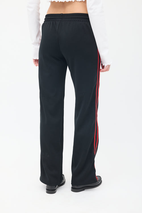 Celine Black 
Red Triomphe Trackpant