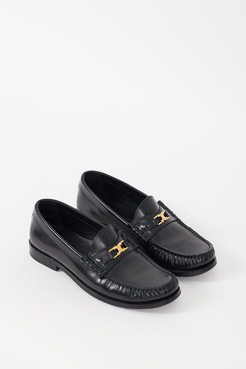 Celine Black 
Gold Leather Luco Triomphe Loafer