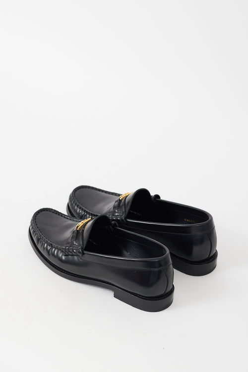 Celine Black 
Gold Leather Luco Triomphe Loafer