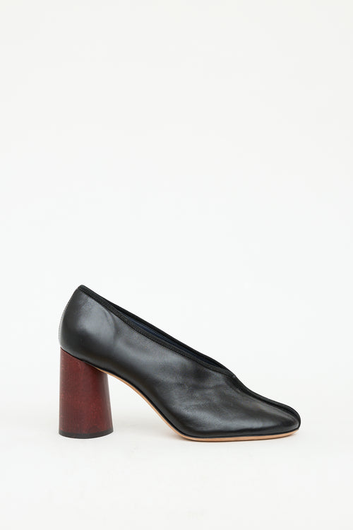 Celine Black 
Brown Leather Centre Seam Heel