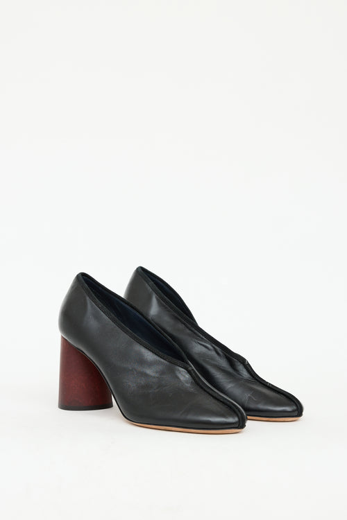 Celine Black 
Brown Leather Centre Seam Heel