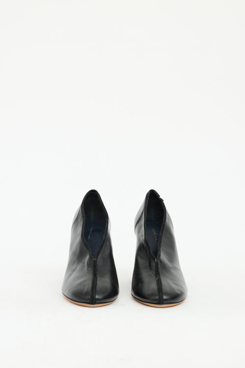 Celine Black 
Brown Leather Centre Seam Heel