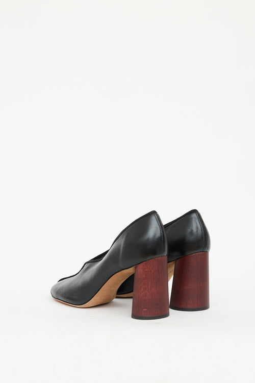 Celine Black 
Brown Leather Centre Seam Heel