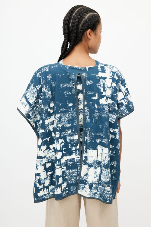 Celine Blue 
White Abstract Drape Top