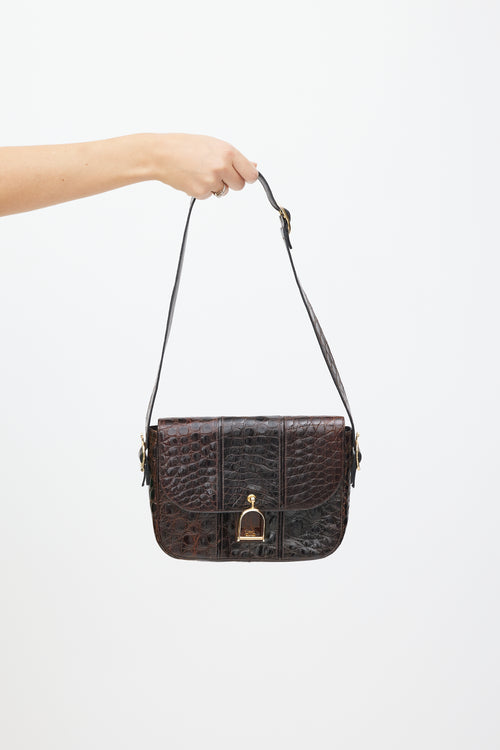 Celine Brown 
Gold Leather Embossed Bag