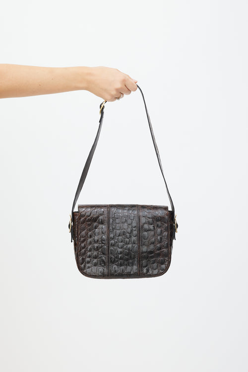 Celine Brown 
Gold Leather Embossed Bag