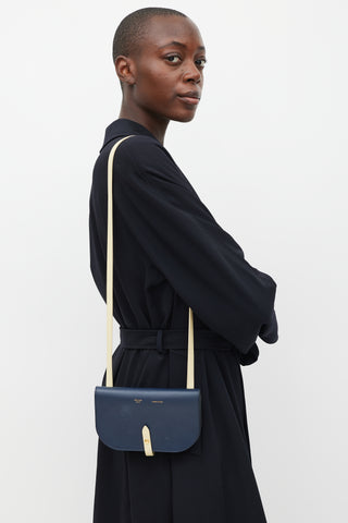 Celine Navy 
Cream Leather Strap Clutch Bag