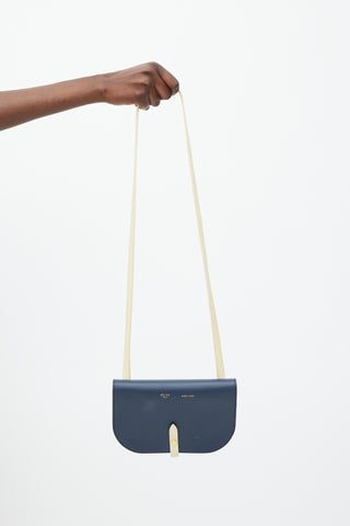 Celine Navy 
Cream Leather Strap Clutch Bag