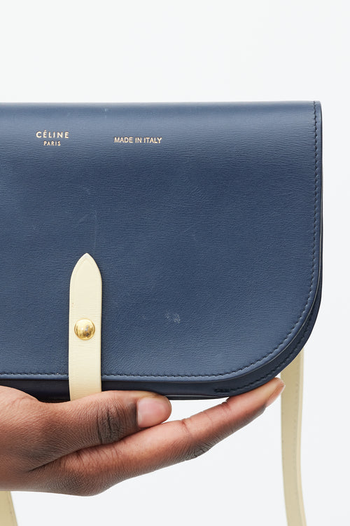 Celine Navy 
Cream Leather Strap Clutch Bag